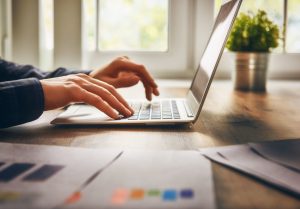 white label businessman using laptop computer sitting working office