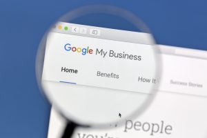 magnifying glass looking at a google my business listing